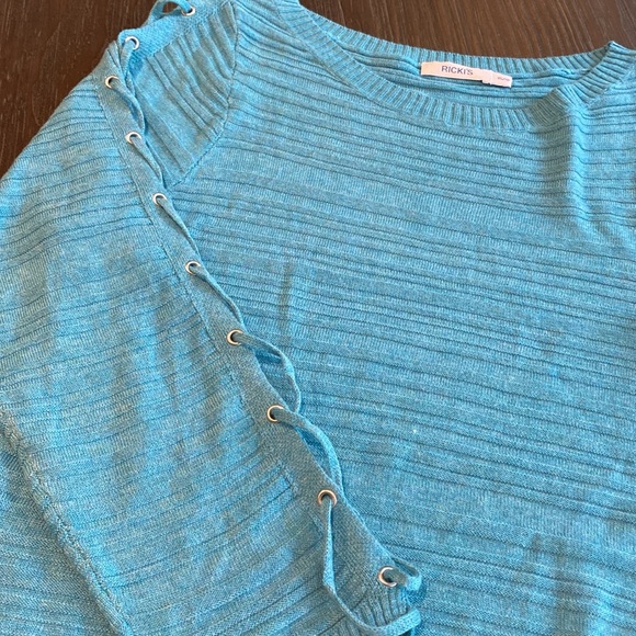 Ricki’s teal blue light sweater in size extra small. - Picture 4 of 9